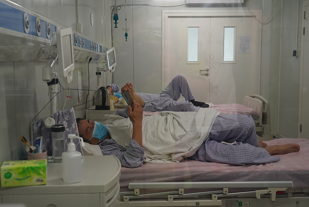 Boy sleeping in hospital bed - Stock Photo - Dissolve